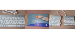 “R-Go Split Break ergonomic keyboard split into two halves on a desk beside a laptop, showing its slim design, left-side shortcut keys, USB-C charging cable, and break indicator LED.”